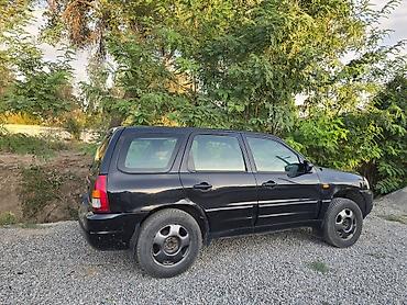 магнитола мазда: Mazda Tribute: 2001 г., 2 л, Механика, Бензин, Кроссовер — 4