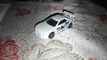 mitsubishi lancer evolution: Kolleksiya üçün die-cast model avtomobil – Nissan Skyline GT-R (R34) — 1