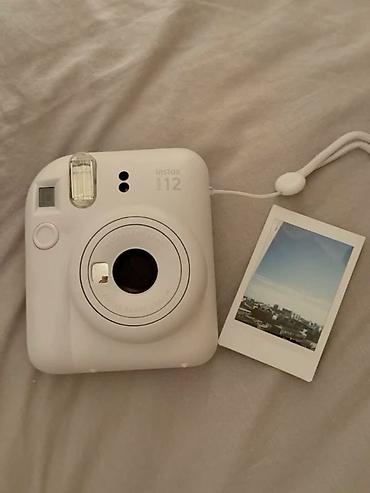buklet capı: Fujifilm Instax mini 12 instant fotoaparat – ağ rəng. Xüsusiyyətlər — 1