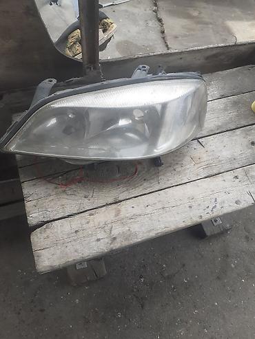 opel babin: Sol, Yaxın və uzaq vuran işıqlar Opel, 1999 il, Orijinal, İşlənmiş — 2