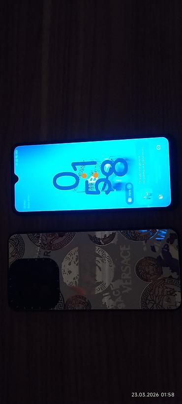 işlənmiş kamera: Redmi 12C, 128 GB, rəng - Mavi, Barmaq izi, İki sim kartlı, Face ID — 2