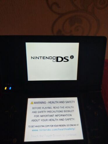 PS5 (Sony PlayStation 5): Nintendo DSi portativ oyun konsolu Xüsusiyyətlər: - Model: Nintendo