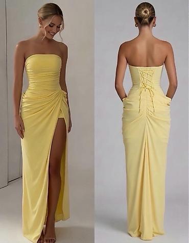 link: Elegantna duga svečana haljina bez bretela

Haljina: 3200 dinara — 1