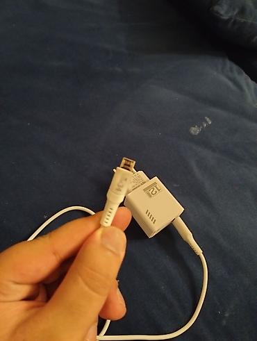 daiso charger: 12W sürətli divar adapteri + Micro‑USB kabel Xüsusiyyətlər: - Güc — 3