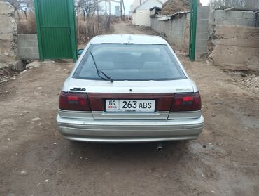 Mazda: Mazda 626: 1990 г., Седан — 4