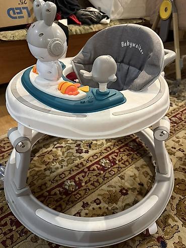 Детские ходунки Babywalker с игровым столиком. - Круглая устойчивая