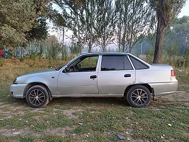 golf 2: Daewoo Nexia: 2009 г., Седан — 3