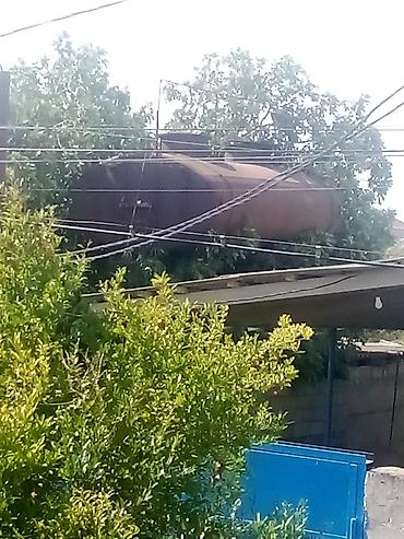 Baklar və çənlər: Metal su çəni – iri həcmli, silindrik formalı.7000-8000 litr hecminde — 9