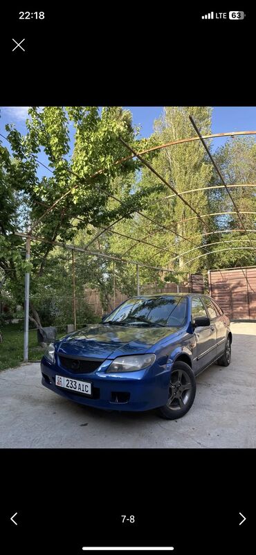Mazda: Mazda 323: 2002 г., 1.6 л, Механика, Бензин, Седан
