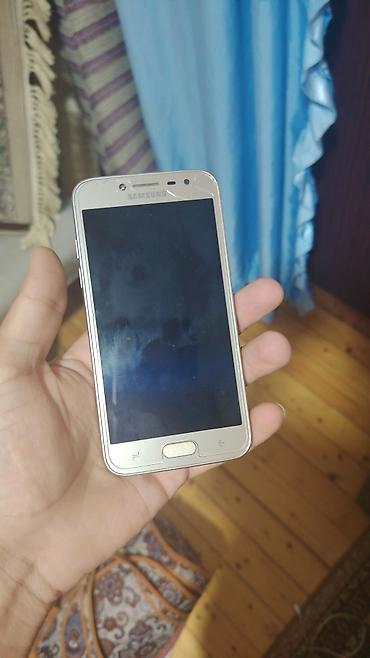 smsung: Samsung J210, 16 GB, rəng - Qızılı, İki sim kartlı — 2
