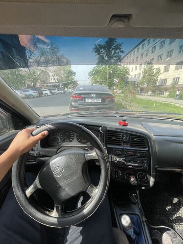 примеру: Nissan Primera: 1997 г., 1.6 л, Механика, Бензин