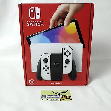 uticnica za ta pec: Uz konzolu dolazi: Tablet (konzola) Dock (postolje za TV) Joy-Con — 1