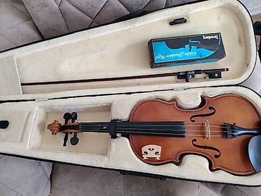 Skripkalar: Skripka dəsti Tərkib: - Tam ölçülü klassik skripka (4/4) - Yay - — 11