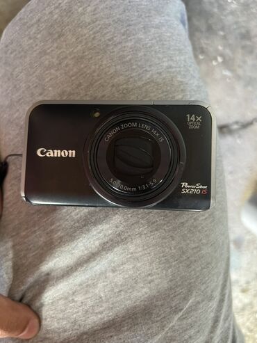 Фотоаппараты: Компактная цифровая фотокамера Canon PowerShot SX210 IS в черном