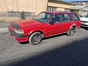 getz 2: Nissan Bluebird: 1987 г., 2 л, Механика, Бензин, Универсал — 1