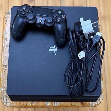 iphon 4: Sony PlayStation 4 Slim 500GB satılır. Konsol tam işlək vəziyyətdədir — 2