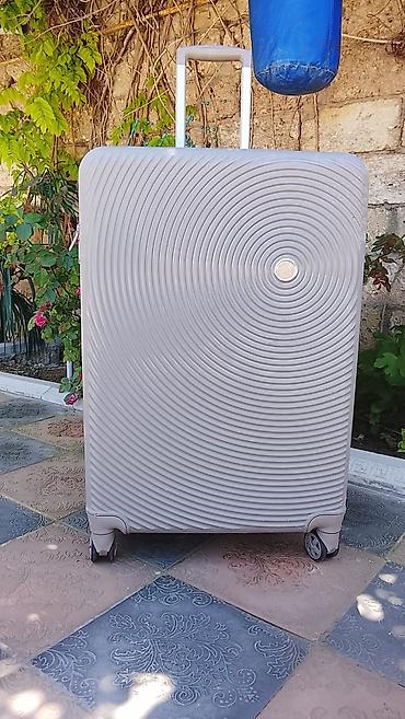 ÇAMADAN 20/25 KG CEKI TUTUR İSTİFADƏ EDILIB PRABLEMI YOXDUR UNVAN BİNƏ
