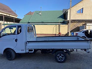 1000: Hyundai Porter II бортовой малотоннажный грузовик - Компоновка — 7