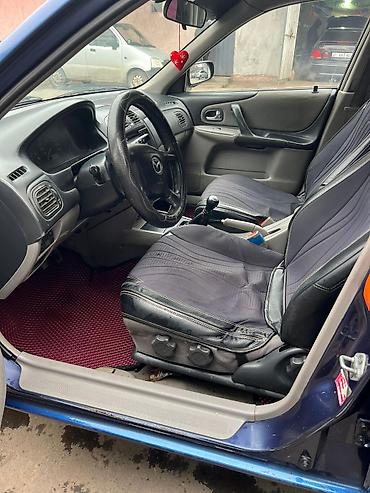 Mazda: Mazda 323: 2002 г., 1.6 л, Механика, Бензин, Хэтчбэк — 15