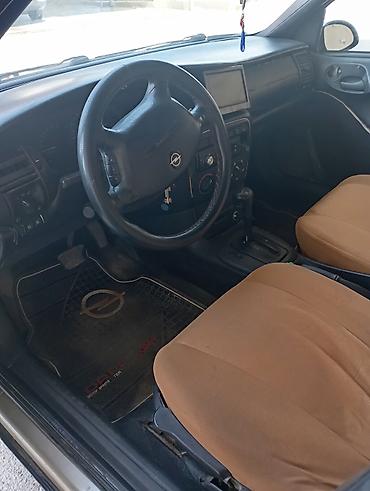 e90 aksesuar: Opel Vectra: 1.8 l | 1997 il 600560 km Sedan — 9