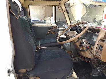 кран камаз: Манипулятор, Nissan, 1986 г., от 4 т — 9