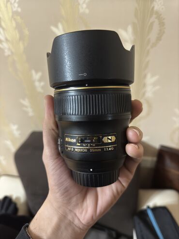 nikon d7200: Nikon 35MM f/1.4 yaxşı vəziyyətdə bir dənə udarı olmayıb cızıqı yoxdu