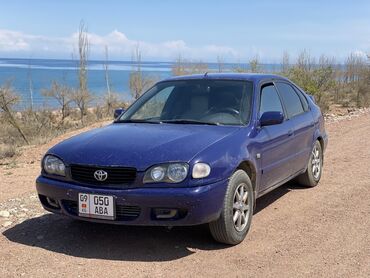 матиз 2 2006: Toyota Corolla синего цвета, кузов хэтчбек. Автомобиль подойдет для