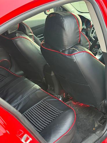 masin salonu: Chevrolet Cruze təcili satılır som qiyməti 13500 — 7