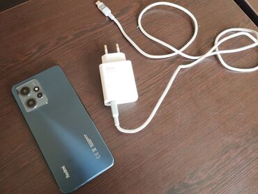 телефон fly ezzy 5: Xiaomi Redmi Note 12, 128 ГБ, цвет - Серый, 
 Сенсорный, Отпечаток пальца, Две SIM карты