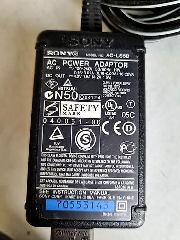 a 23: Блок питания, адаптер CANON AD-360U, 13V, 1.8A SONY AC-LS5B, 4.2V — 5