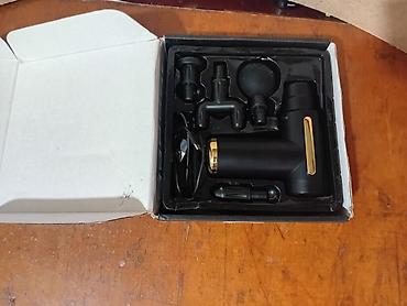 Masajorlar: Məhsul: MASSAGE GUN – portativ masaj pistol Təsvir: - Kompakt, “T” — 1