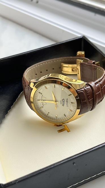 saatı öyrənmək: Tissot kişilər üçün klassik qol saatı - İsveçrə kvars mexanizmi — 2