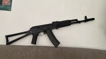мишень для лука: Страйкбольная реплика автомата АК-74М, выполненная в черном цвете