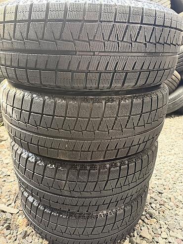 Комплект зимних шин Bridgestone Blizzak - Размер: 215/60 R16 - Индекс