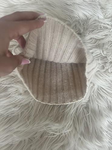 papaqlar kisi ucun: Rib toxumalı, bej rəngli trikotaj papaq. - Model: klassik beanie - — 2