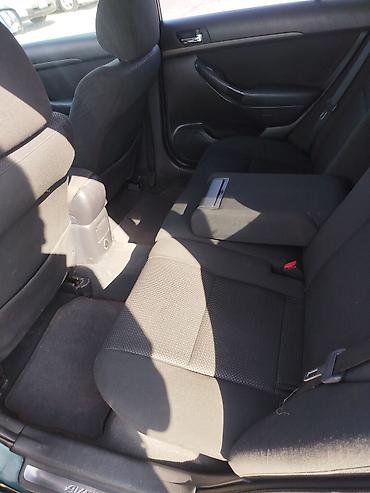 саната желтый: Toyota Avensis: 2004 г., 1.8 л, Механика, Бензин, Универсал — 6