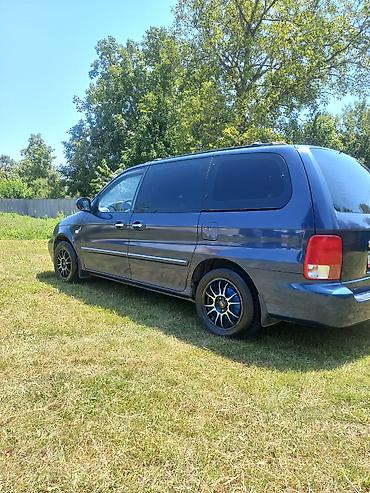 Kia: Kia Carnival: 2.9 l | 2002 il Van/Minivan — 6