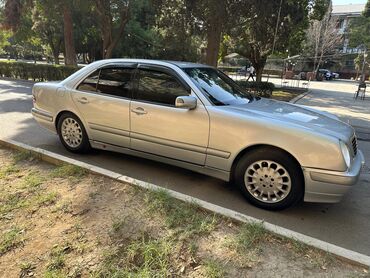 Комбинезоны: Mercedes-Benz E-Class: 2.8 л | 1999 г. Седан