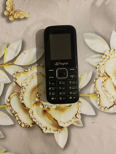 kalonka islenmis: Kompakt portativ kgtel - Rəng: qara - Korpus: hamar plastik - Forma