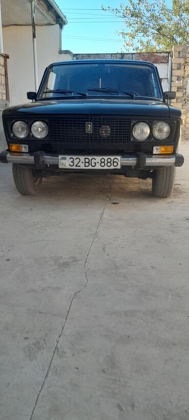 çeşqa maşın: Avtomobil: Lada (VAZ) 2106 “Jiquli” Kuzov: Sedan, qara rəng Nömrə
