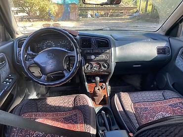 мото каракол: Nissan Primera: 1999 г., 2 л, Кол менен иштөөчү, Бензин, Седан — 2