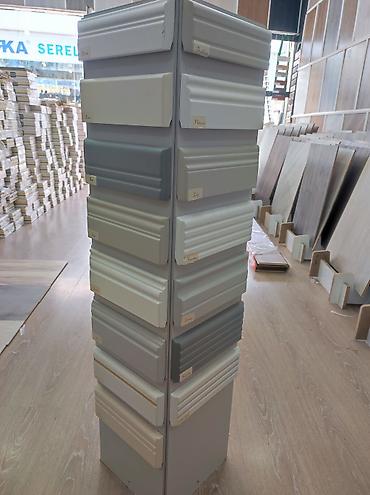 Boyük seçimli döşəmə plintusları – dekorativ profilli MDF/plastik