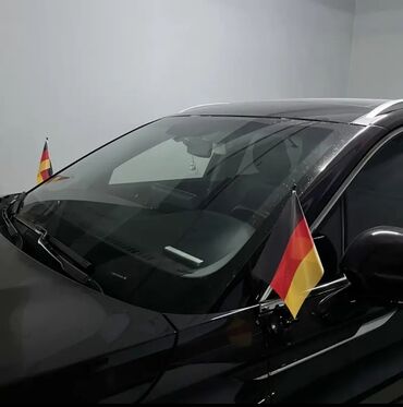 крепления для лыж на авто: Два автомобильных флажка с изображением флага Германии. Флаги крепятся