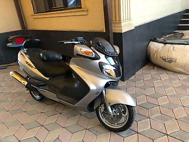 Suzuki: Suzuki Skywave 650 (Burgman) – крупный туристический максискутер — 7