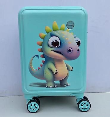suknje ps: Dečiji kofer tirkizne boje sa motivom dinosaurusa. Kofer poseduje — 3