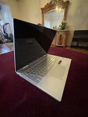 hp envy home: Prosessor: Intel Core i7 – 8-ci nəsil RAM: 12 GB SSD: 512 GB Ekran — 6