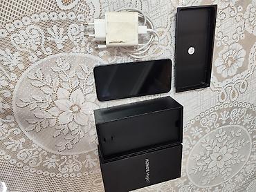 Мобильные телефоны: Honor Magic 7, 256 ГБ, цвет - Черный, Отпечаток пальца, Face ID — 2