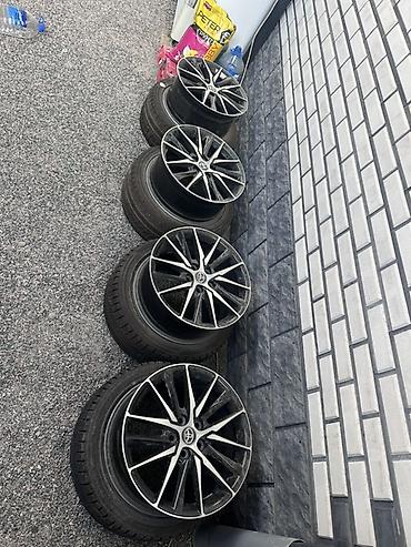 124 e500: Комплект из 4 оригинальных литых дисков Toyota с шинами. - Диаметр — 1