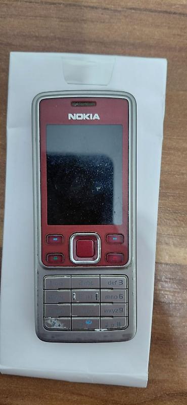nokia n76: Nokia 6300 (RM‑217), красно‑серебристая версия. Классический кнопочный — 5