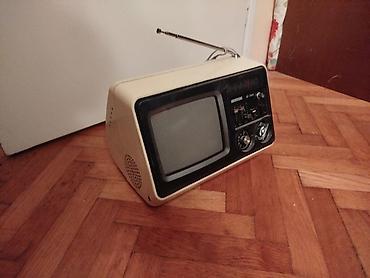 Stari uređaji: Retro tv stari Universum televizor.Prodaje se kao dekoracija jer vise — 11